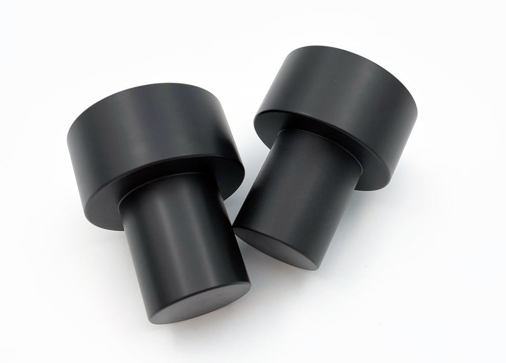 Black CNC turned parts with different surfaces